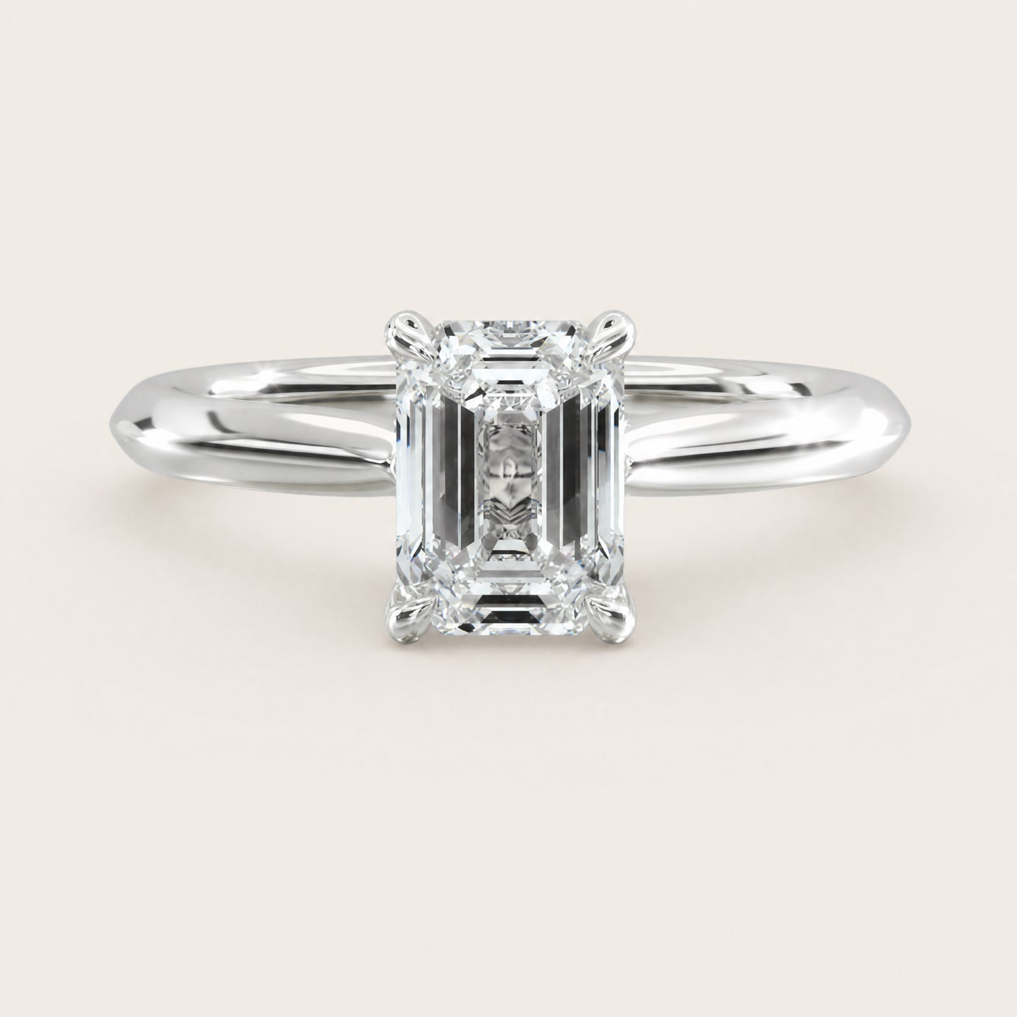 Montez Knife Edge Solitaire – Hidden Halo – emerald